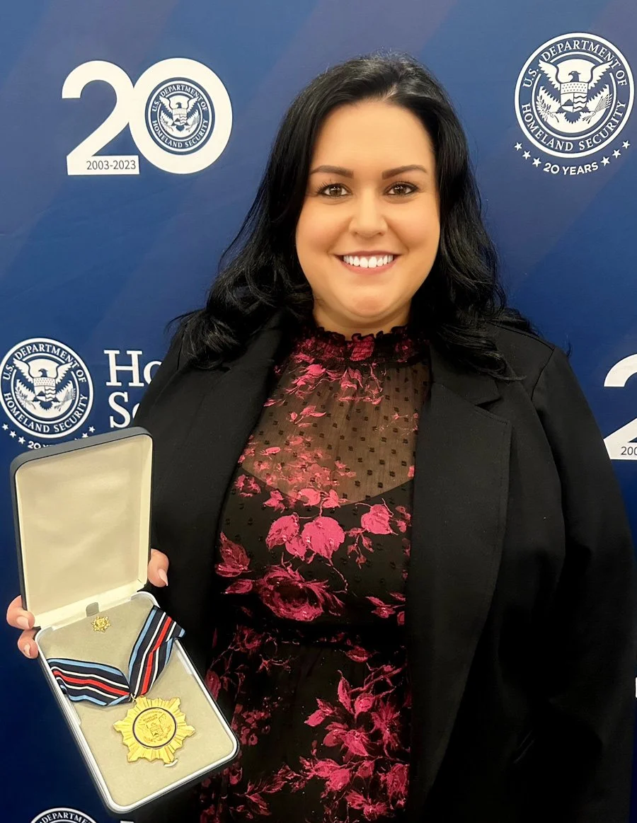 Trina Swanson receiving the DHS Secretary's Award