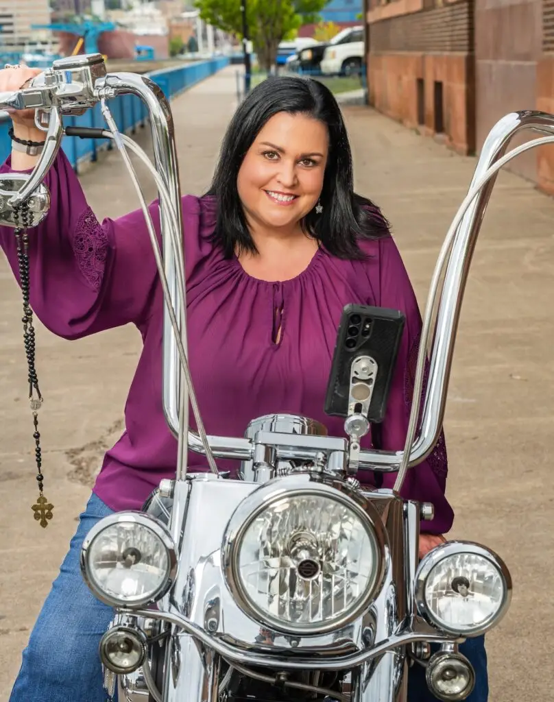 Trina on a motorcycle