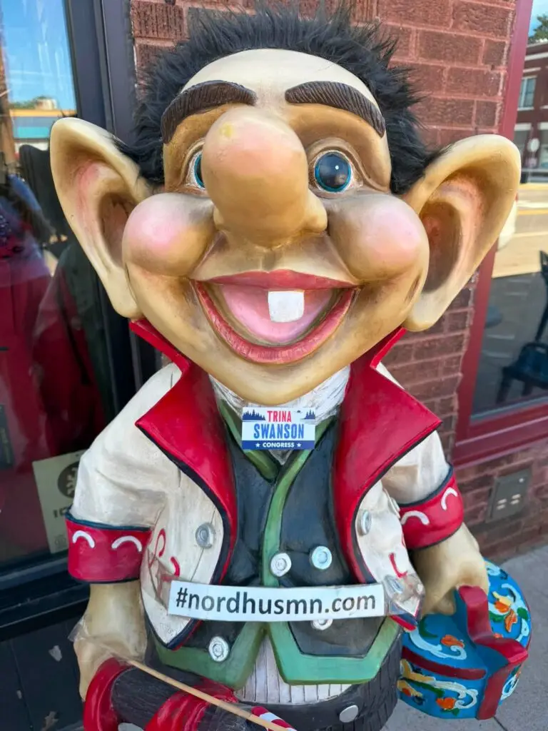 statue with a trina for congress sticker.