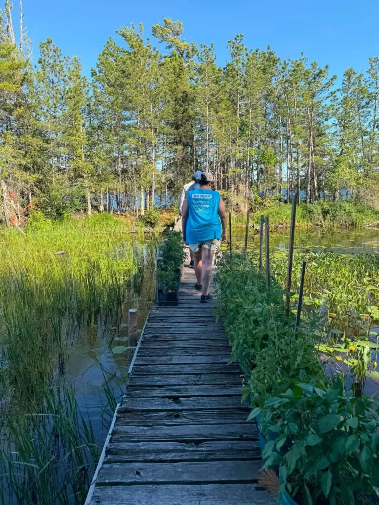 Trina walking in the wetlands.