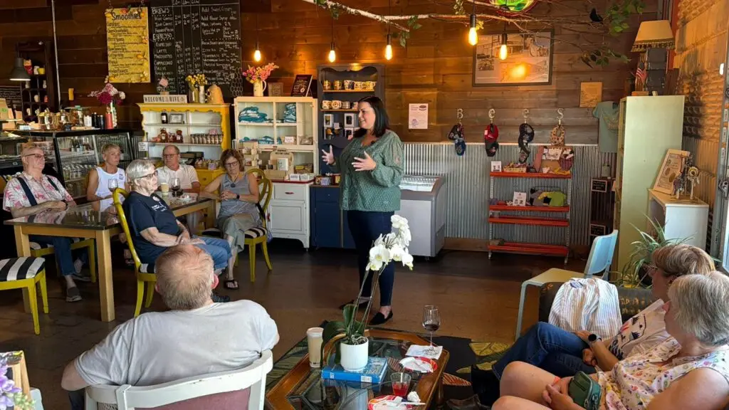 Trina speaking at a local event in MN Distric 8