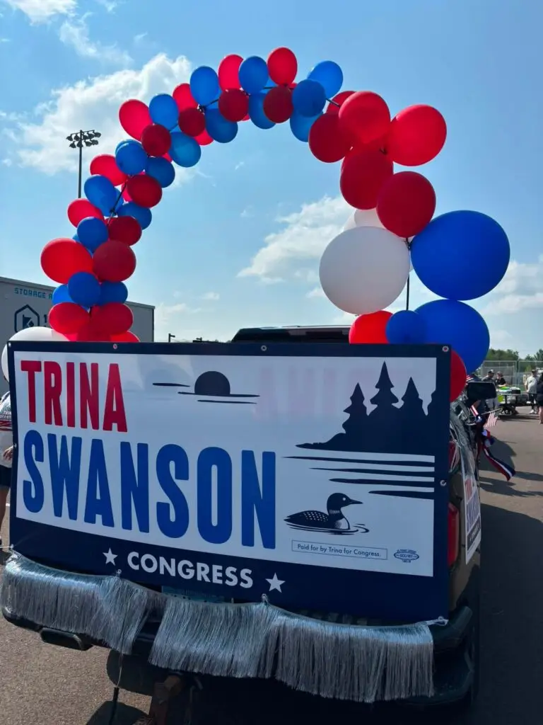 Trina Swanson sign and balloons.